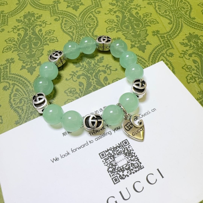 G*u*i bracelets